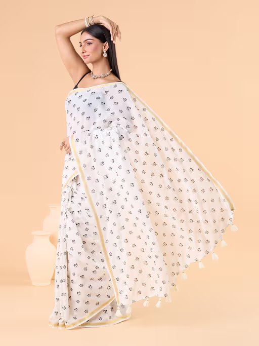 VISCOUS SAREE WITH BLACK DOTS DESIGNS AND GOLDEN BORDER FRAME
