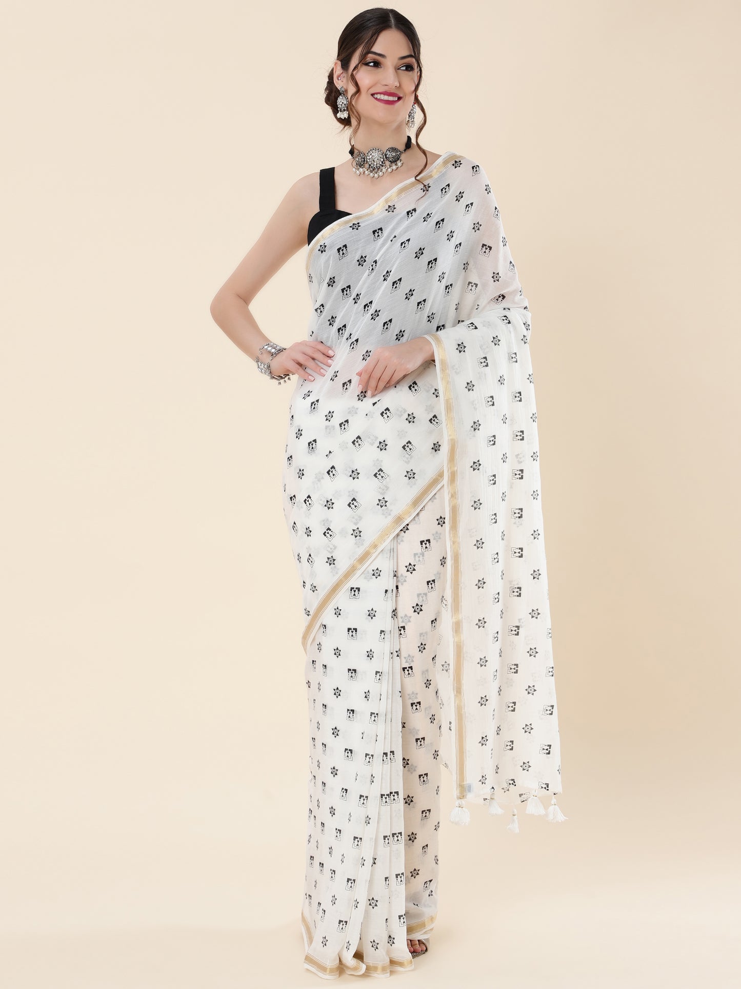 VISCOUS SAREE WITH BLACK DOTS DESIGNS AND GOLDEN BORDER FRAME