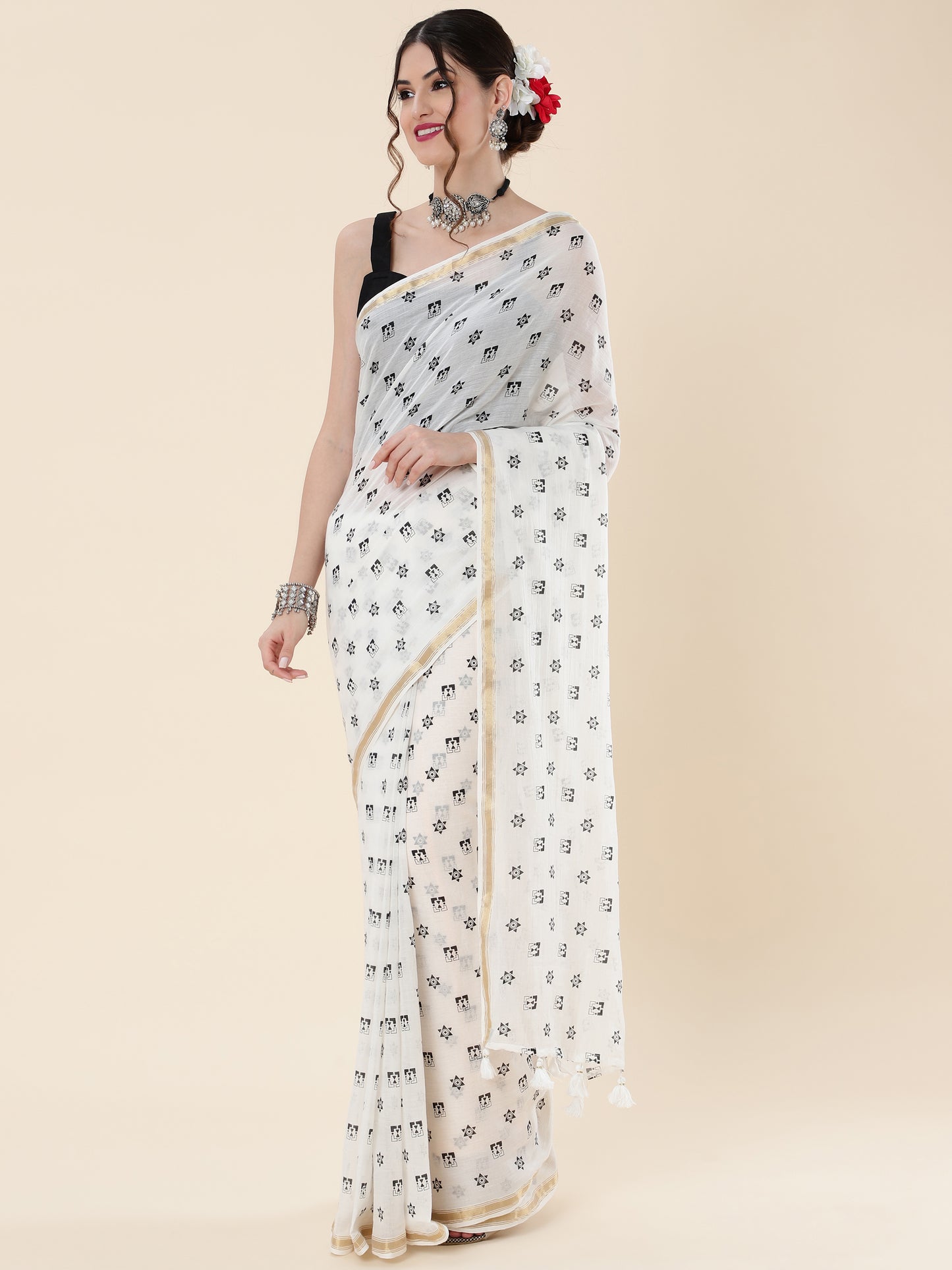 VISCOUS SAREE WITH BLACK DOTS DESIGNS AND GOLDEN BORDER FRAME