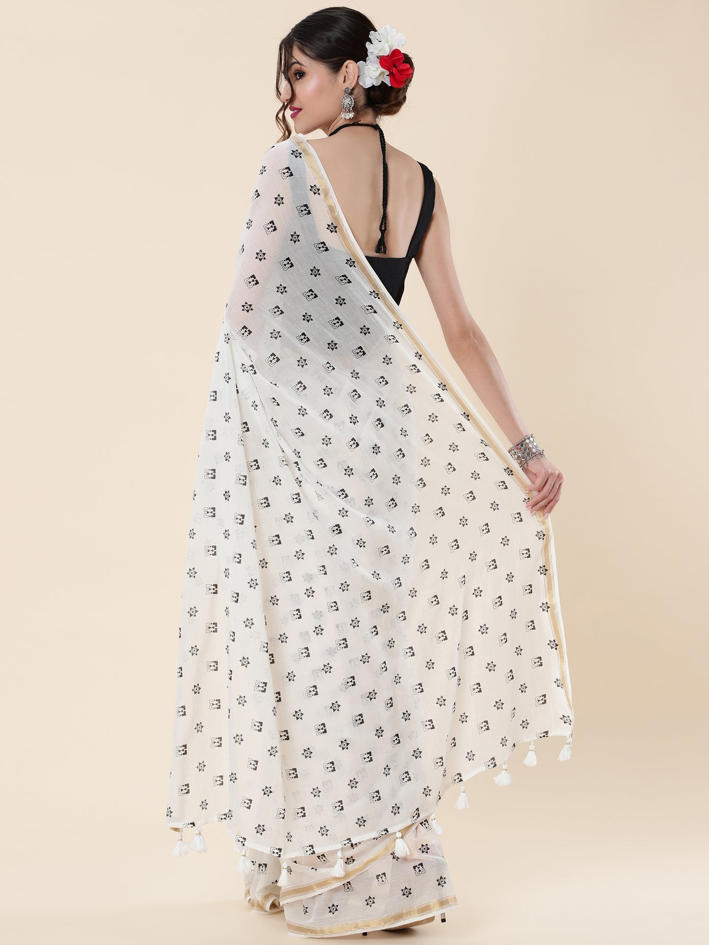 VISCOUS SAREE WITH BLACK DOTS DESIGNS AND GOLDEN BORDER FRAME