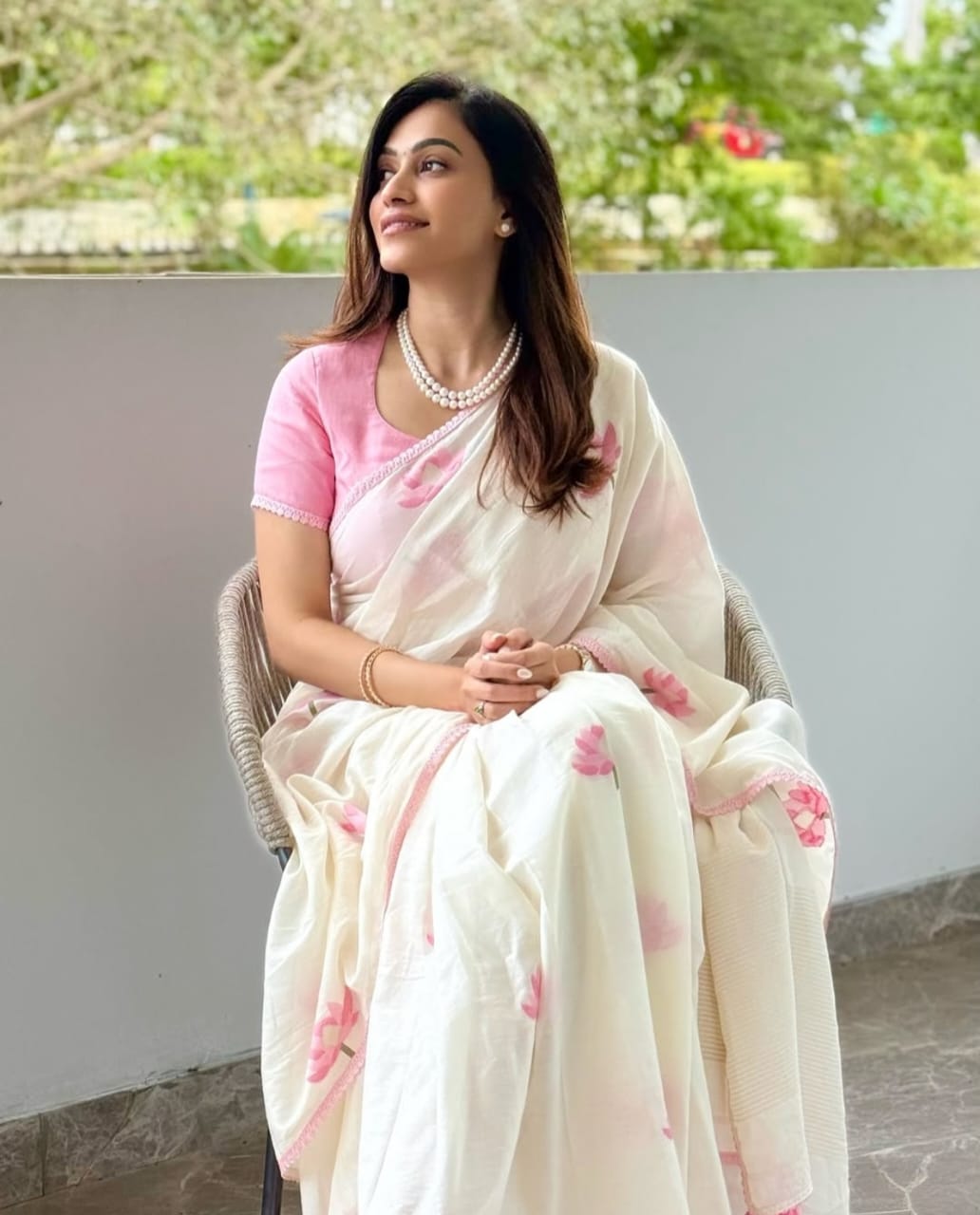 WHISPERS OF BLOSSOM – Ivory Linen Saree with Pink Floral Elegance