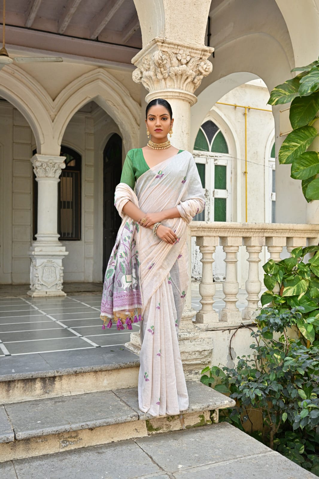 Off-White Muga Silk Saree with Violet, Pink, Blue & Purple Floral Variants.