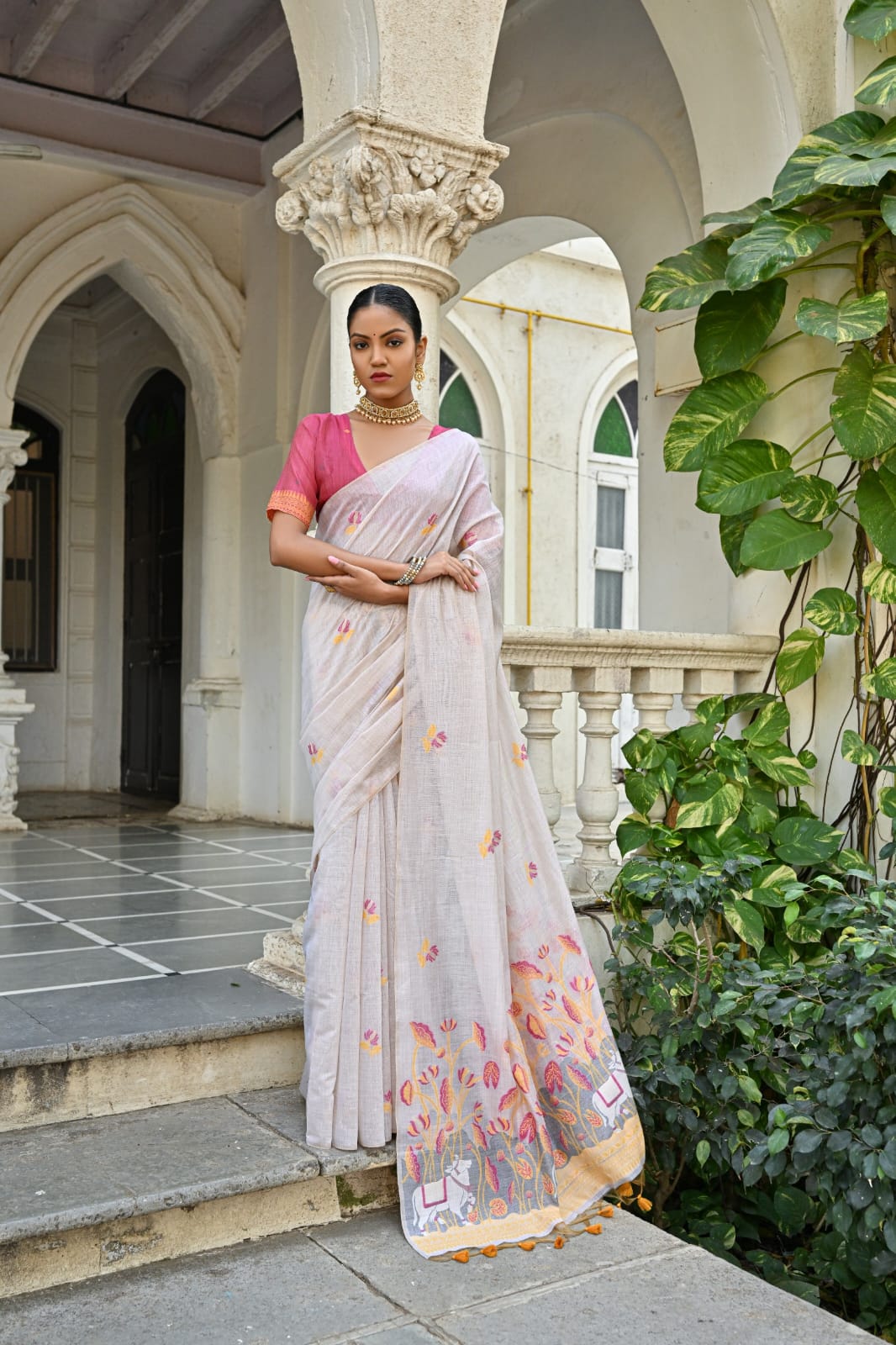 Off-White Muga Silk Saree with Violet, Pink, Blue & Purple Floral Variants.