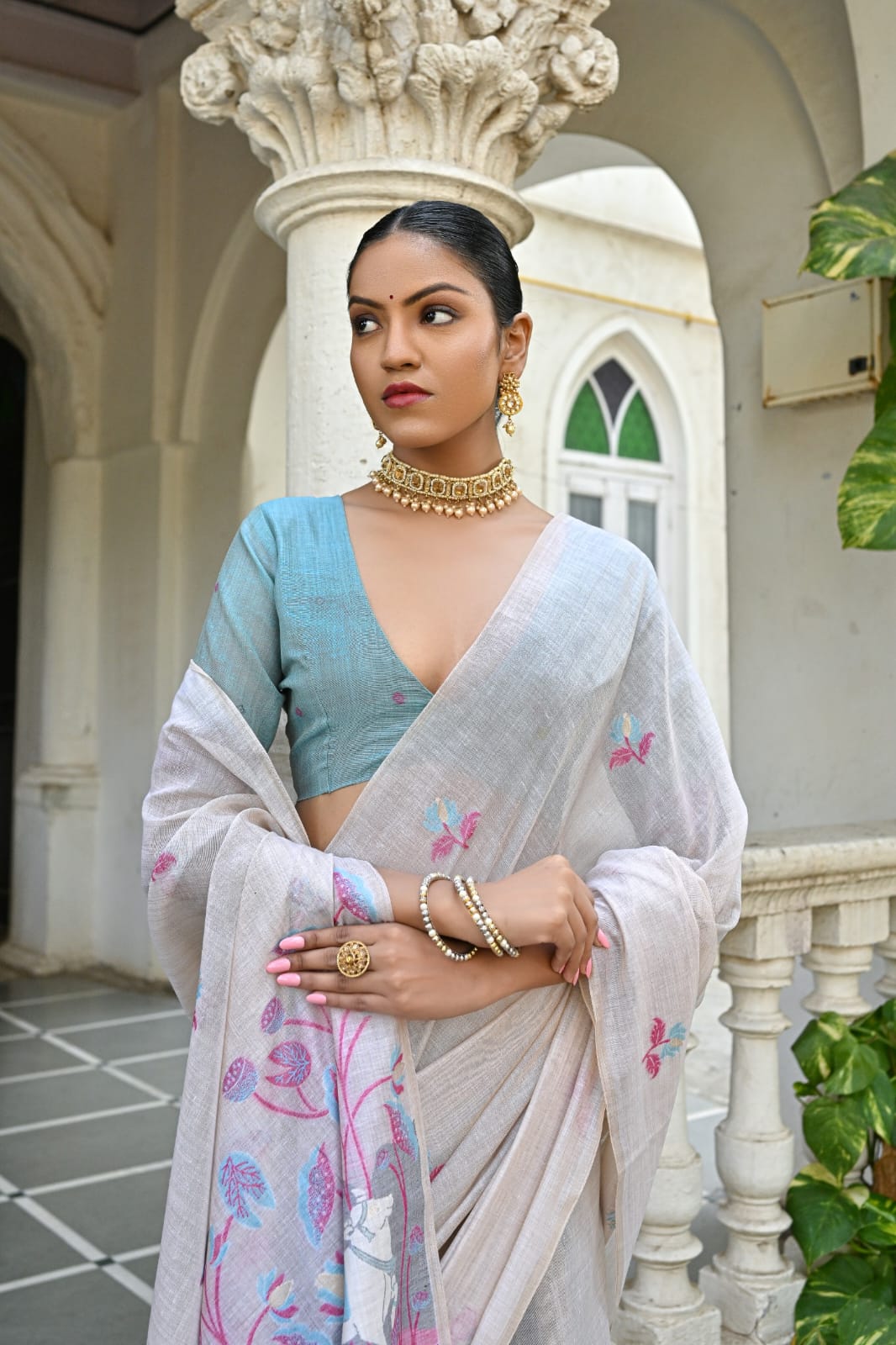Off-White Muga Silk Saree with Violet, Pink, Blue & Purple Floral Variants.