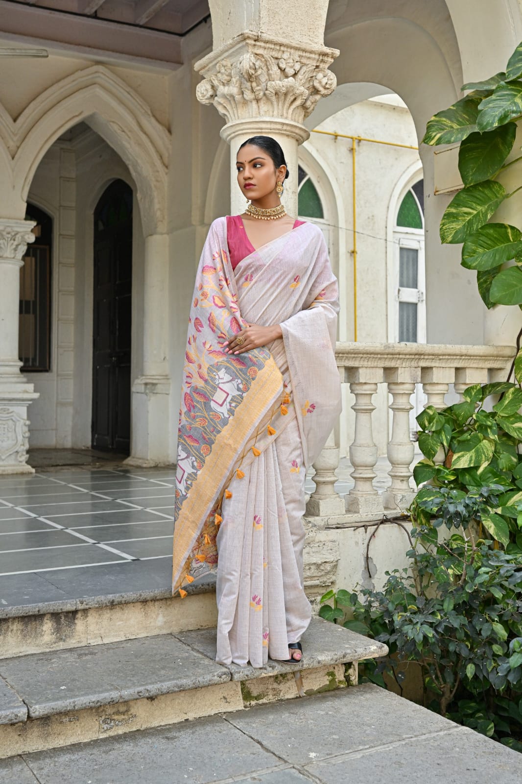 Off-White Muga Silk Saree with Violet, Pink, Blue & Purple Floral Variants.