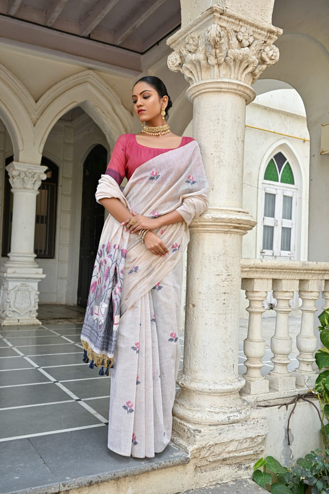 Off-White Muga Silk Saree with Violet, Pink, Blue & Purple Floral Variants.