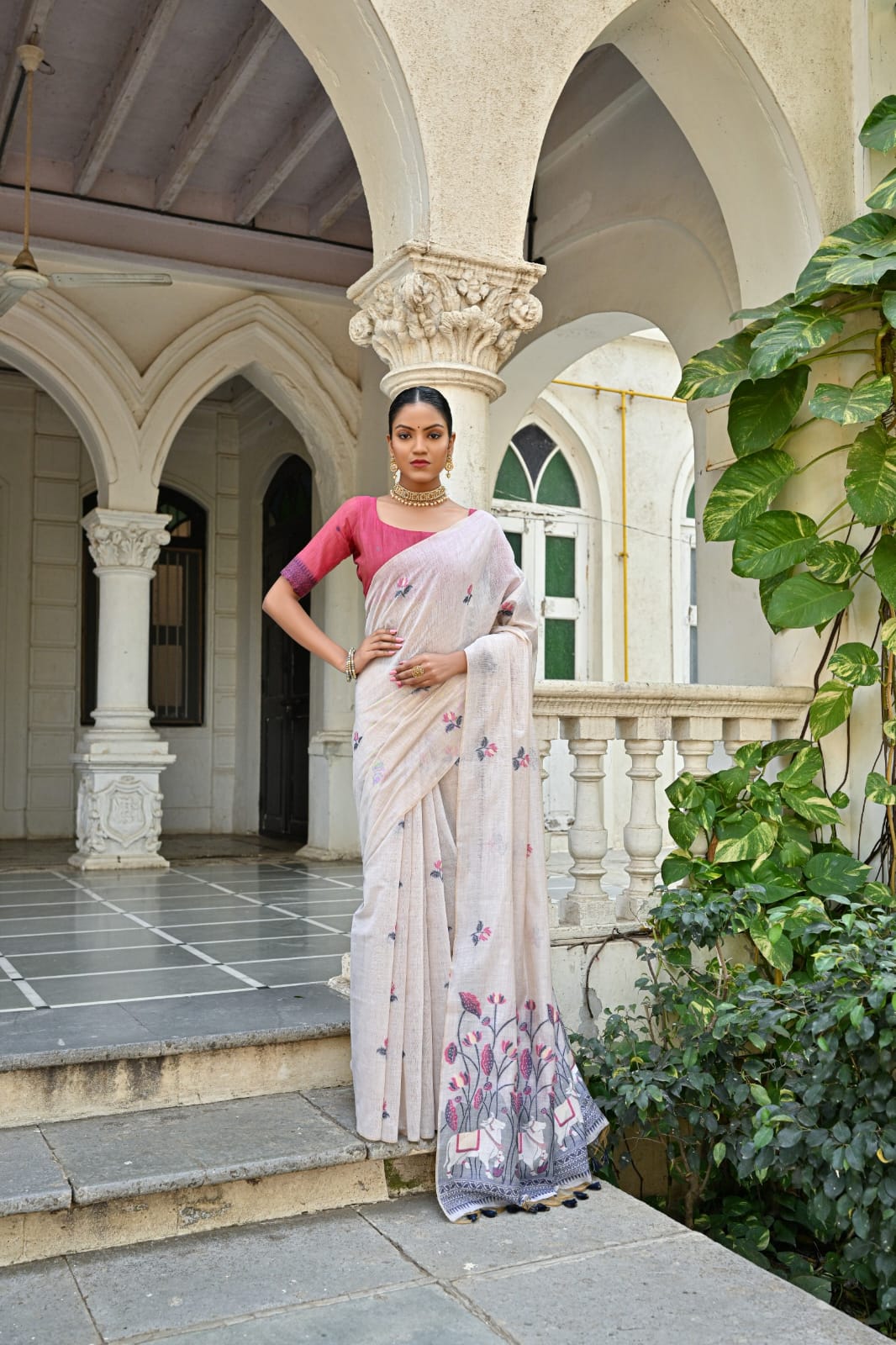 Off-White Muga Silk Saree with Violet, Pink, Blue & Purple Floral Variants.