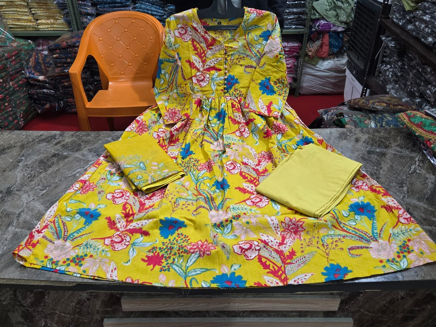 Vibrant Yellow Printed Cotton Kurti Set.