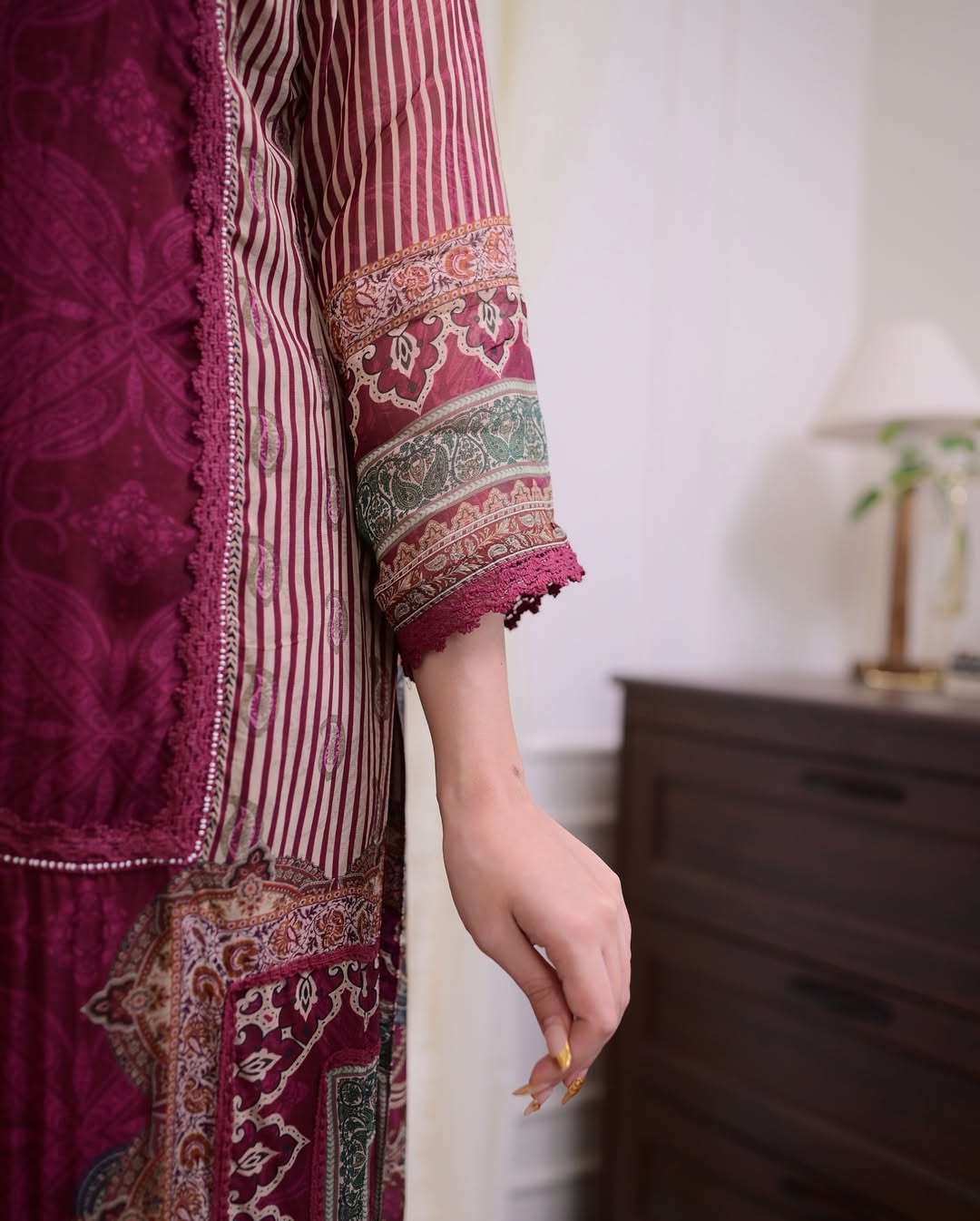 Maroon Muslin Pakistani Suit Set with Golden Accents.