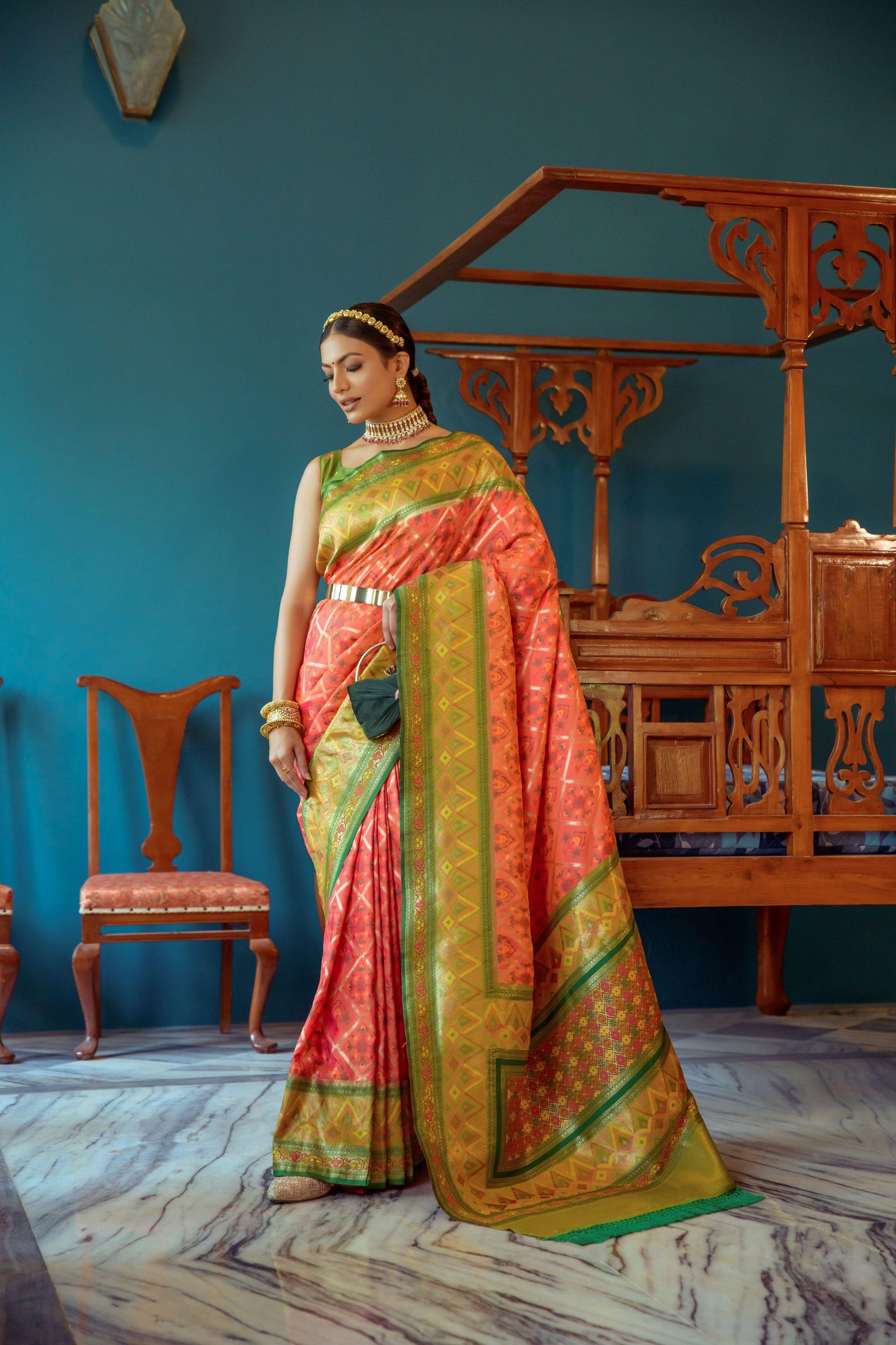 Vibrant Banarasi Silk Saree with Contrast Patola Border & Brocade Blouse.