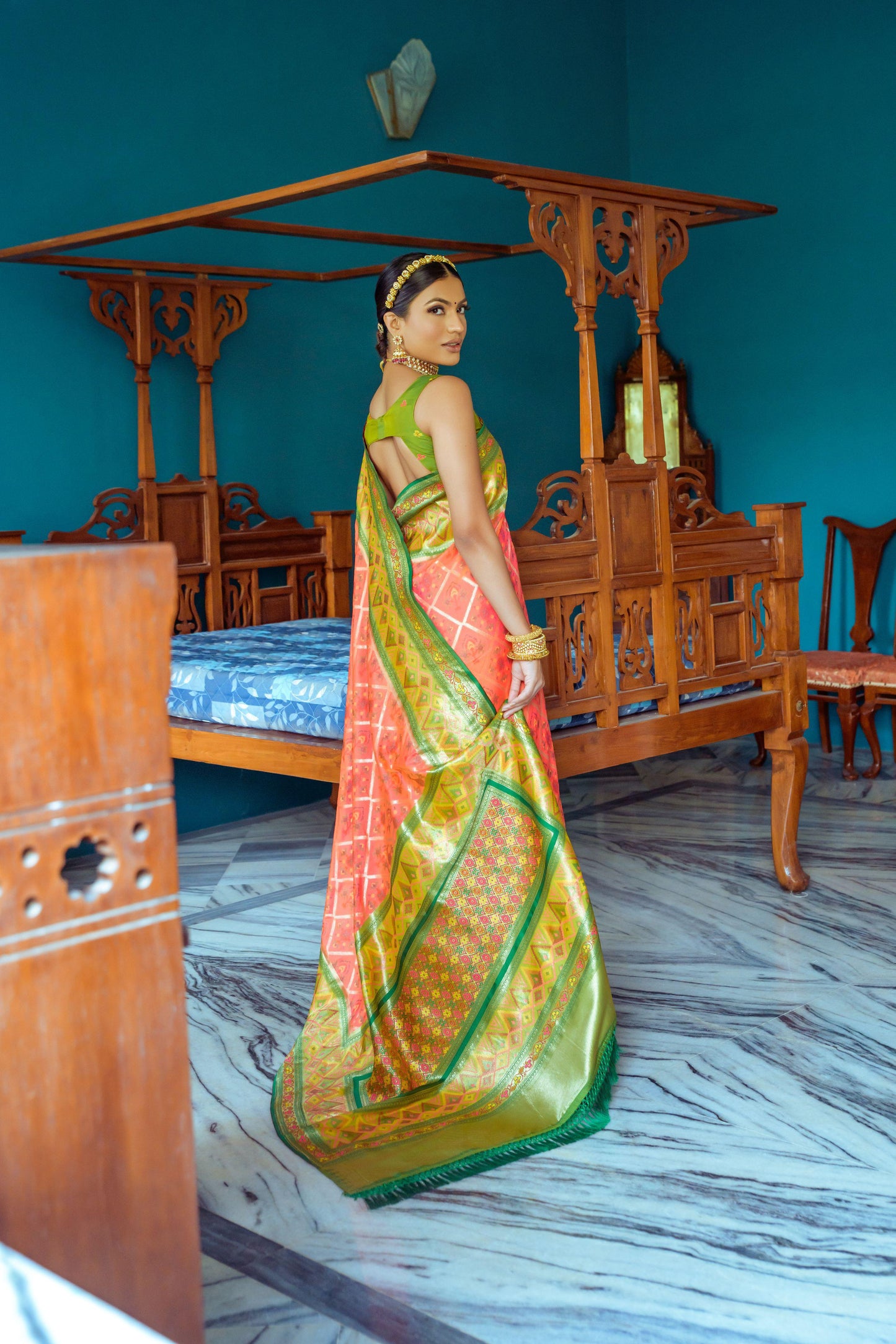 Vibrant Banarasi Silk Saree with Contrast Patola Border & Brocade Blouse.