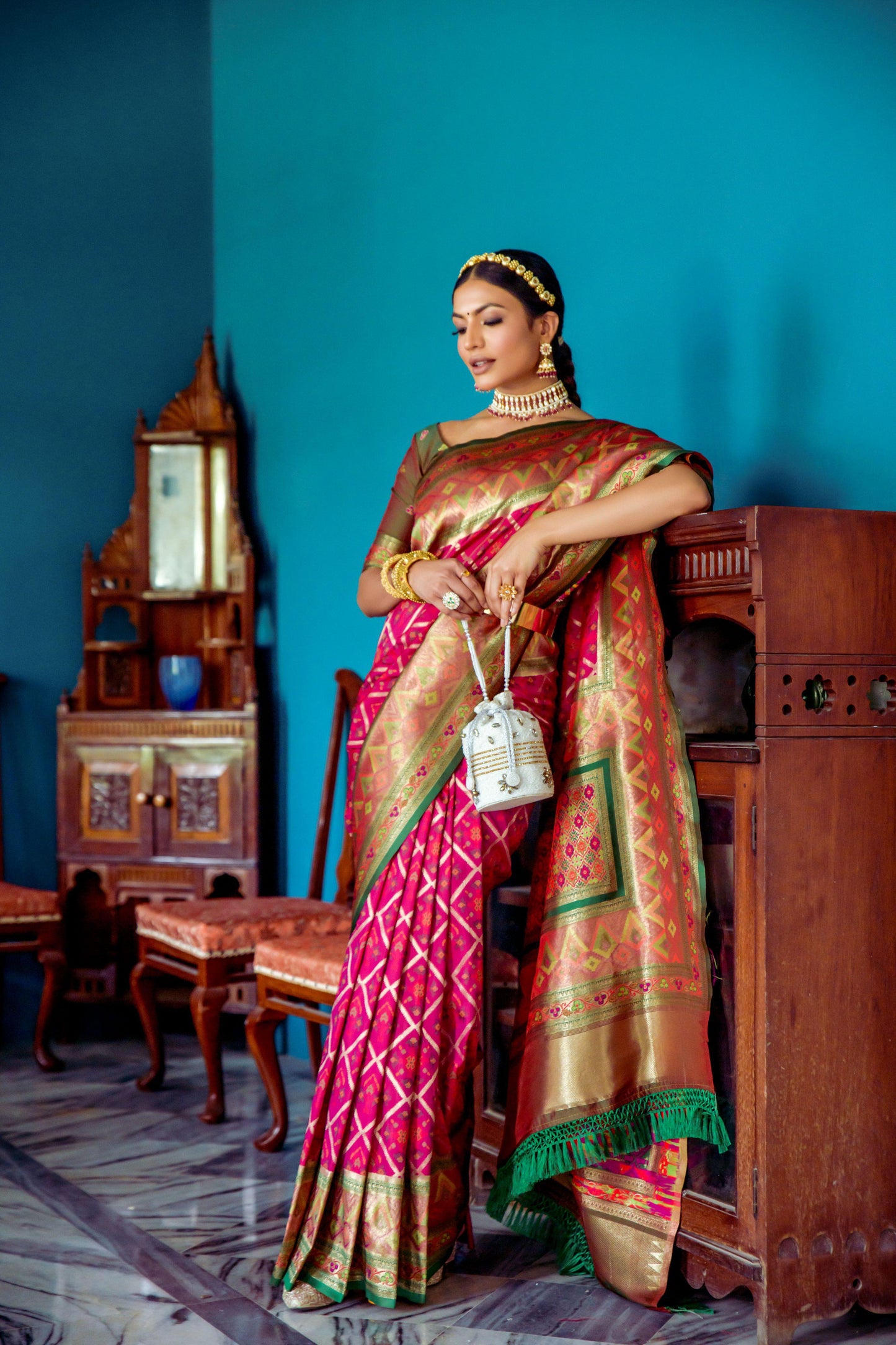 Vibrant Banarasi Silk Saree with Contrast Patola Border & Brocade Blouse.