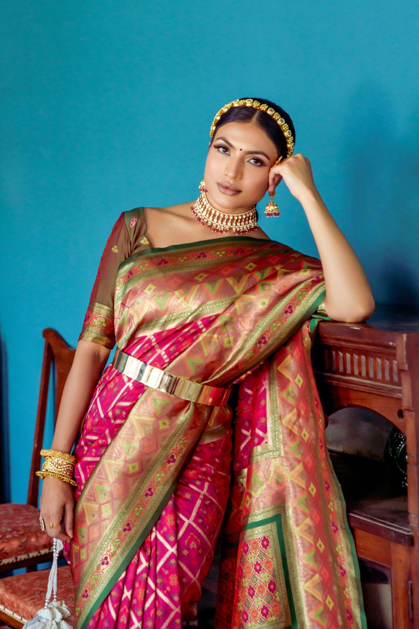 Vibrant Banarasi Silk Saree with Contrast Patola Border & Brocade Blouse.