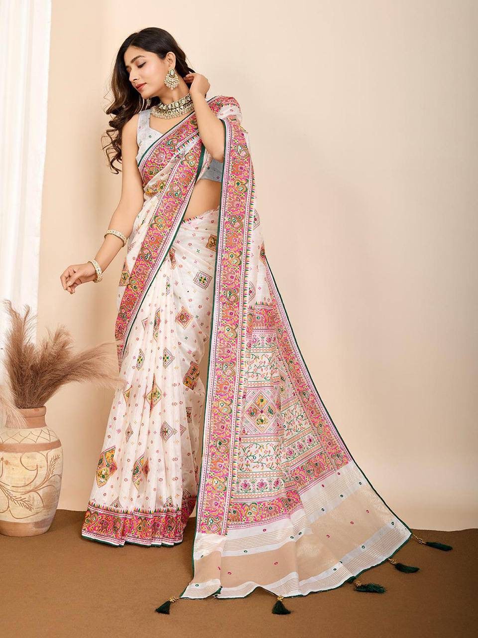 Pearl White Patola Silk Saree with Multicolour Motifs