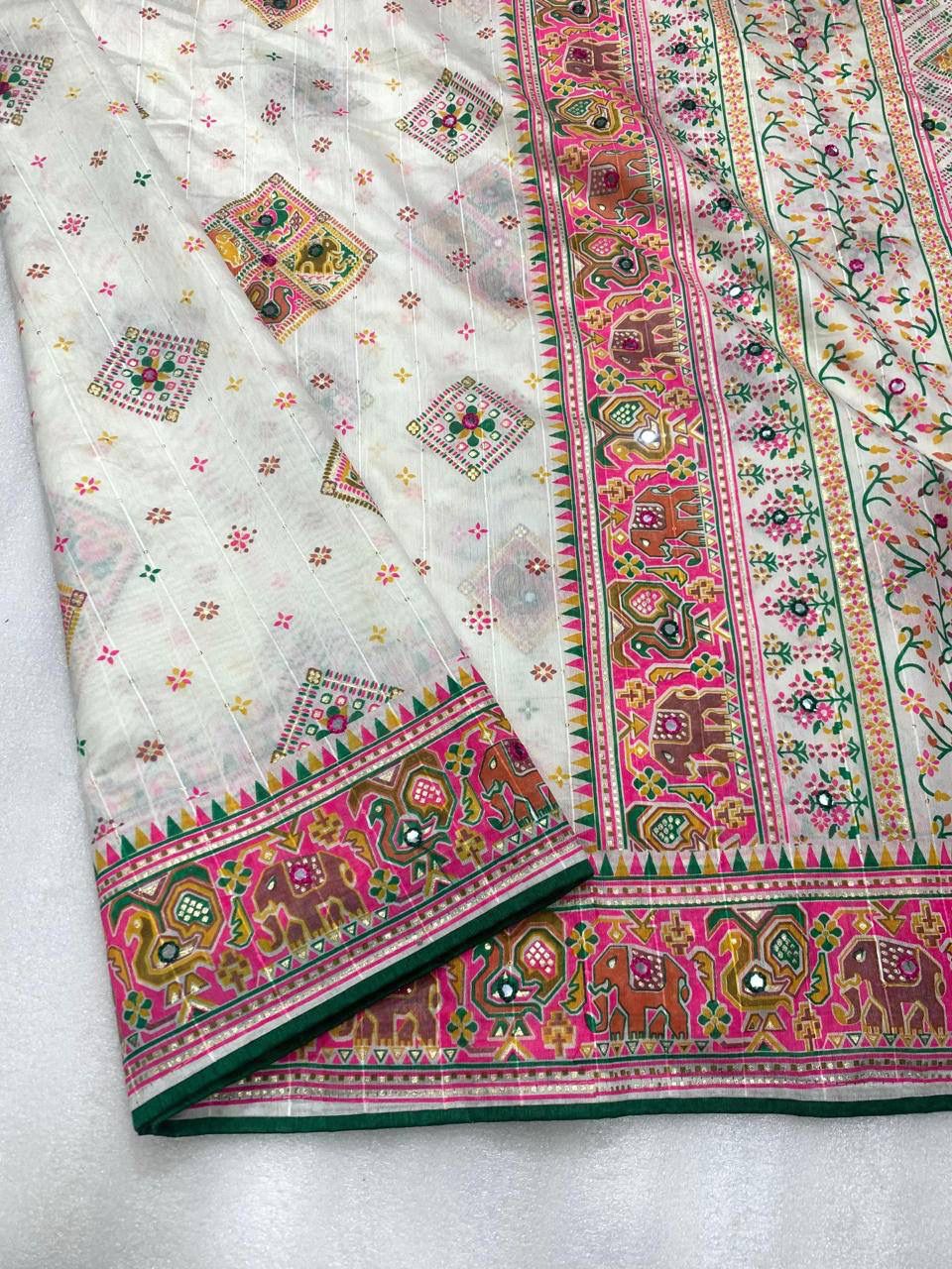 Pearl White Patola Silk Saree with Multicolour Motifs
