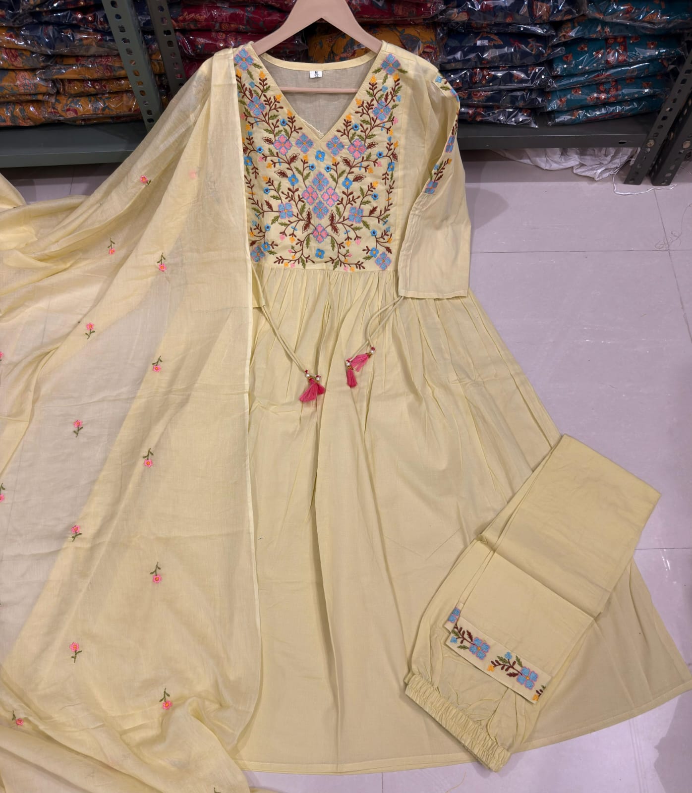 Pastel Green Anarkali Kurta Set with Embroidery & Dori Detailing.