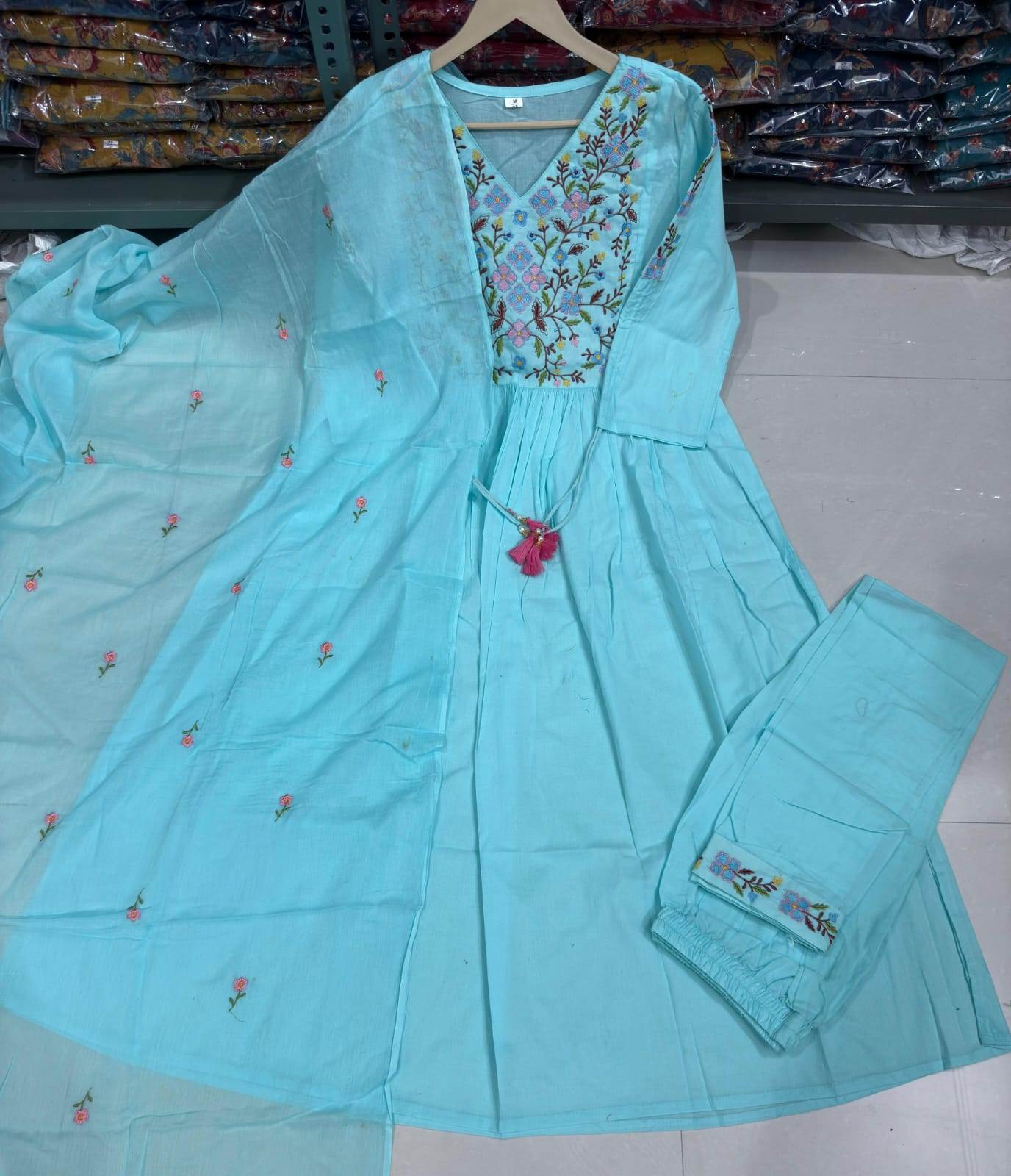Pastel Green Anarkali Kurta Set with Embroidery & Dori Detailing.