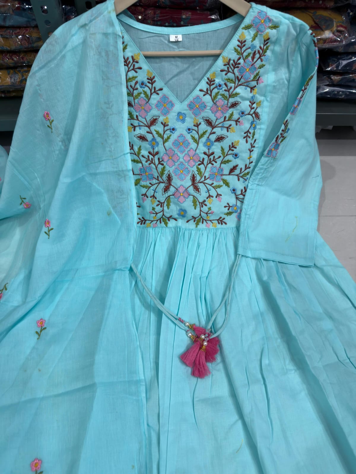 Pastel Green Anarkali Kurta Set with Embroidery & Dori Detailing.