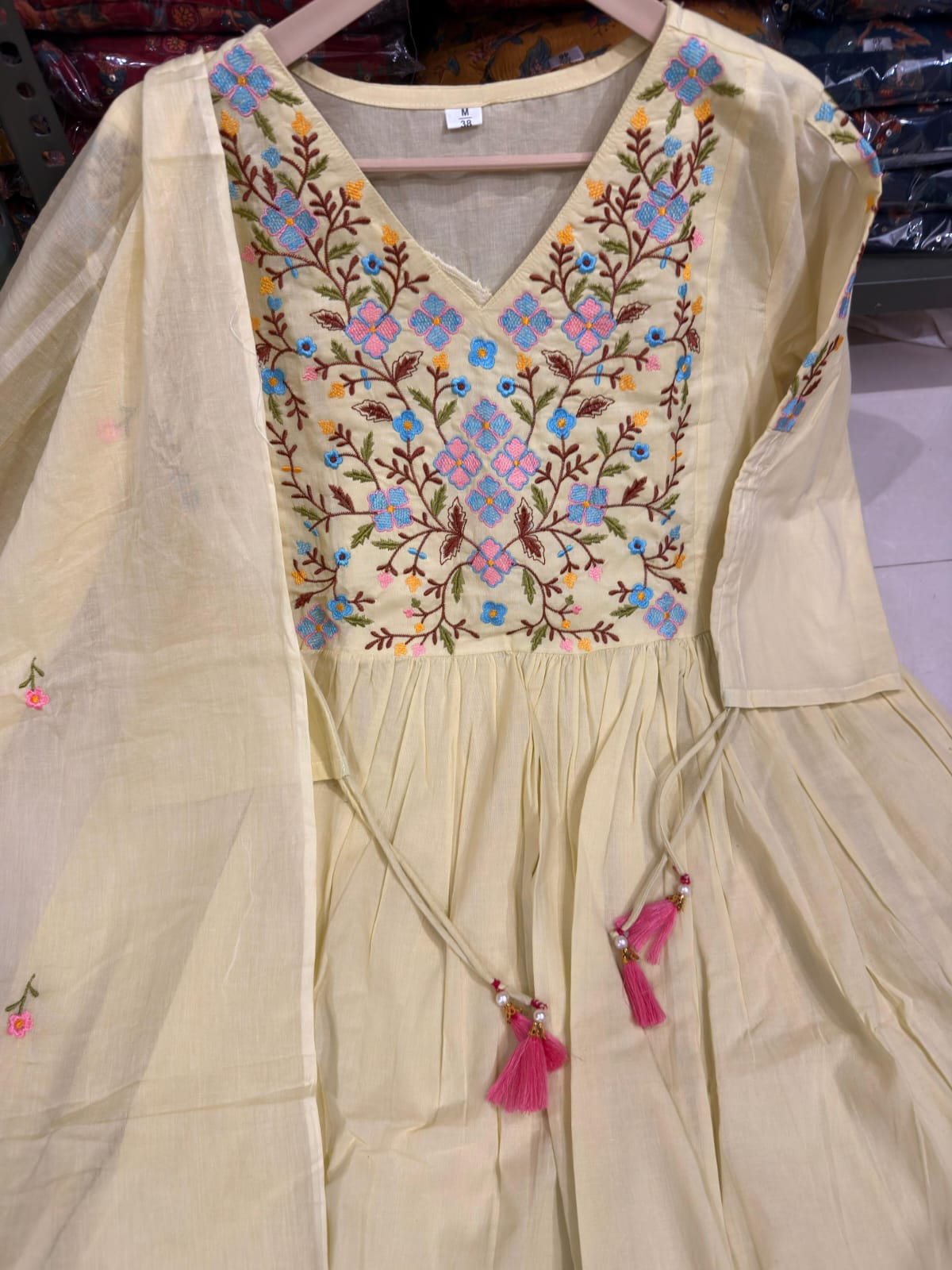 Pastel Green Anarkali Kurta Set with Embroidery & Dori Detailing.