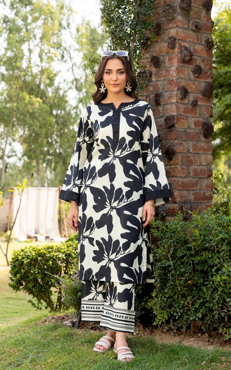 White Kurti Set with Bold Black Leaf Print & Palazzo Pants.
