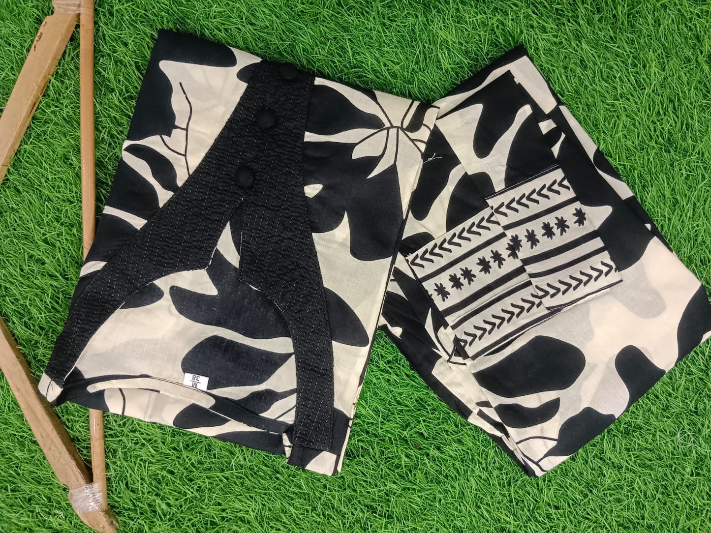 White Kurti Set with Bold Black Leaf Print & Palazzo Pants.