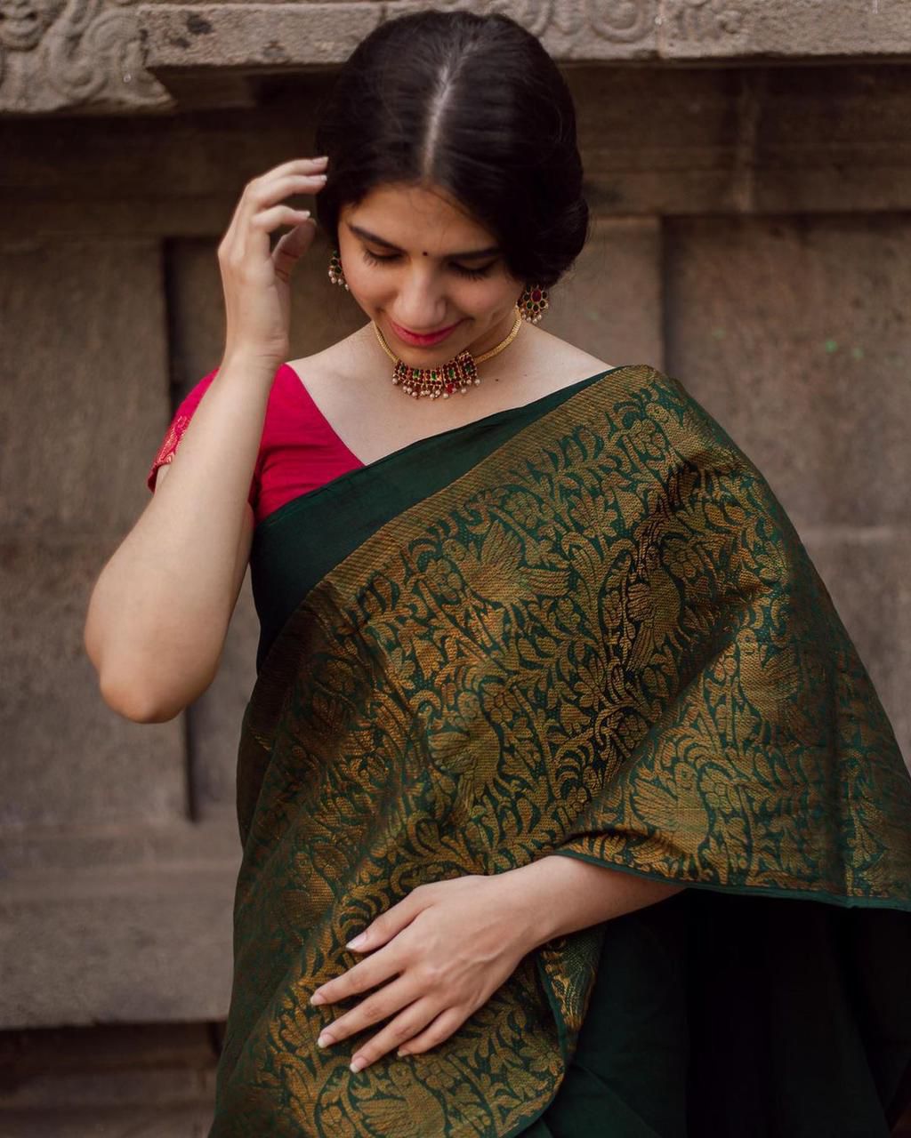 Dark Green Litchi Silk Saree with Red Jacquard Blouse.