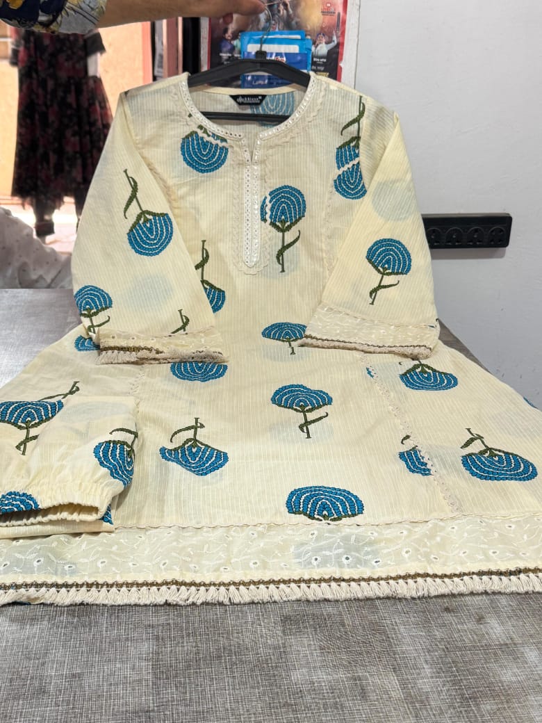 Premium Embroidered Kurta Palazzo Set.