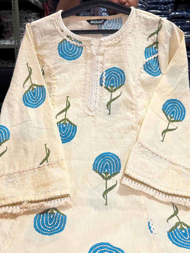 Premium Embroidered Kurta Palazzo Set.
