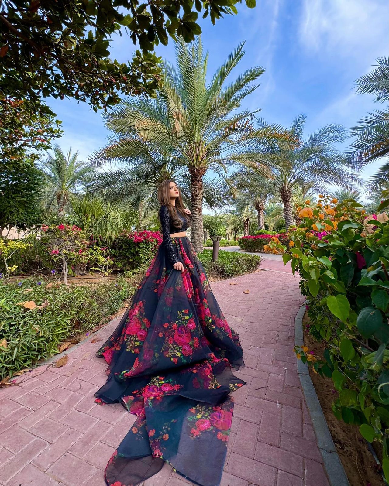 Exclusive Black Sequin Blouse with Organza Floral Lehenga Set.