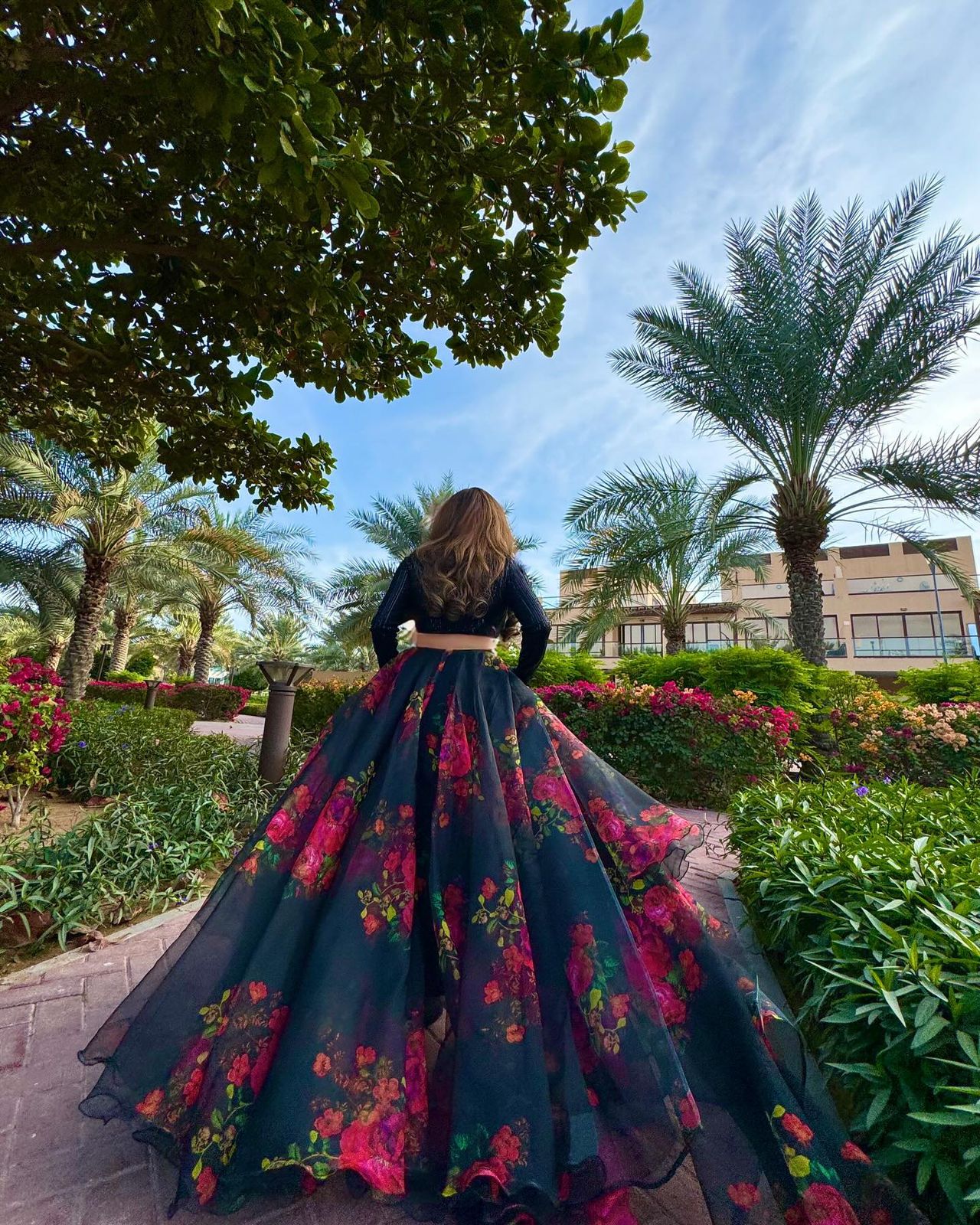 Exclusive Black Sequin Blouse with Organza Floral Lehenga Set.