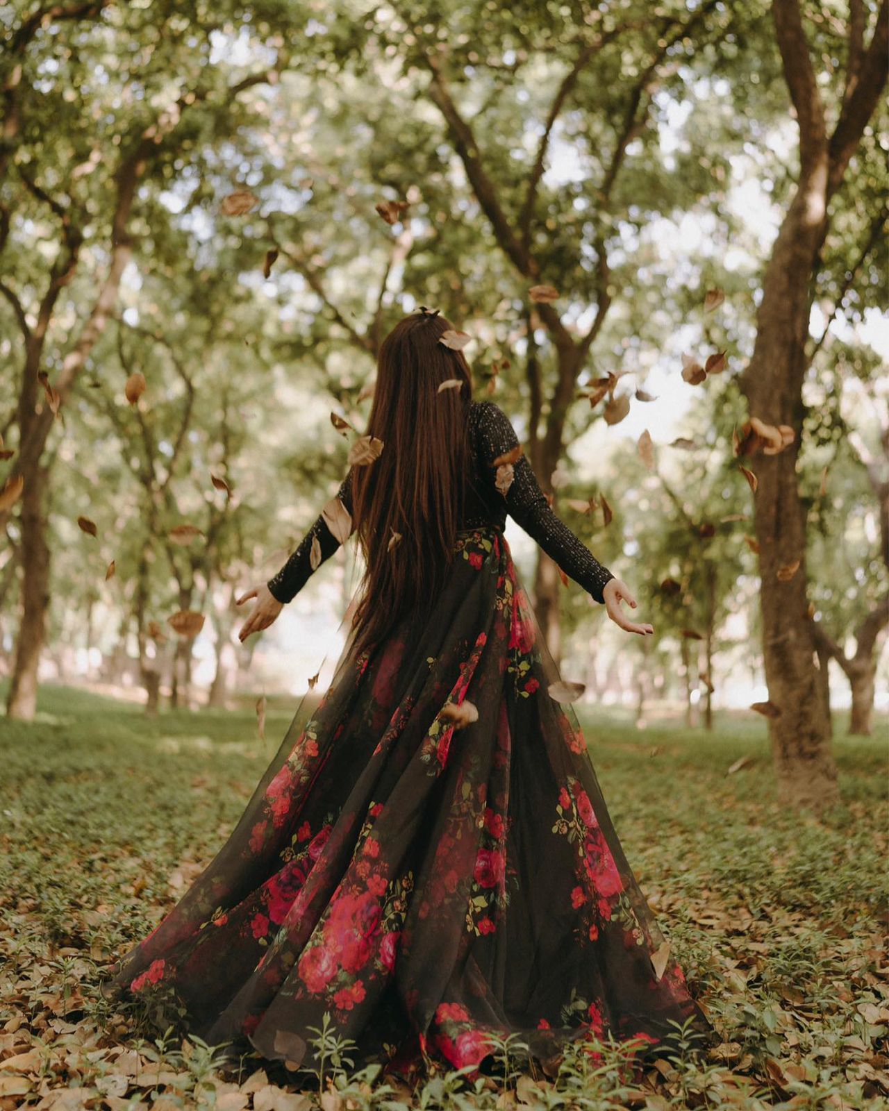 Exclusive Black Sequin Blouse with Organza Floral Lehenga Set.