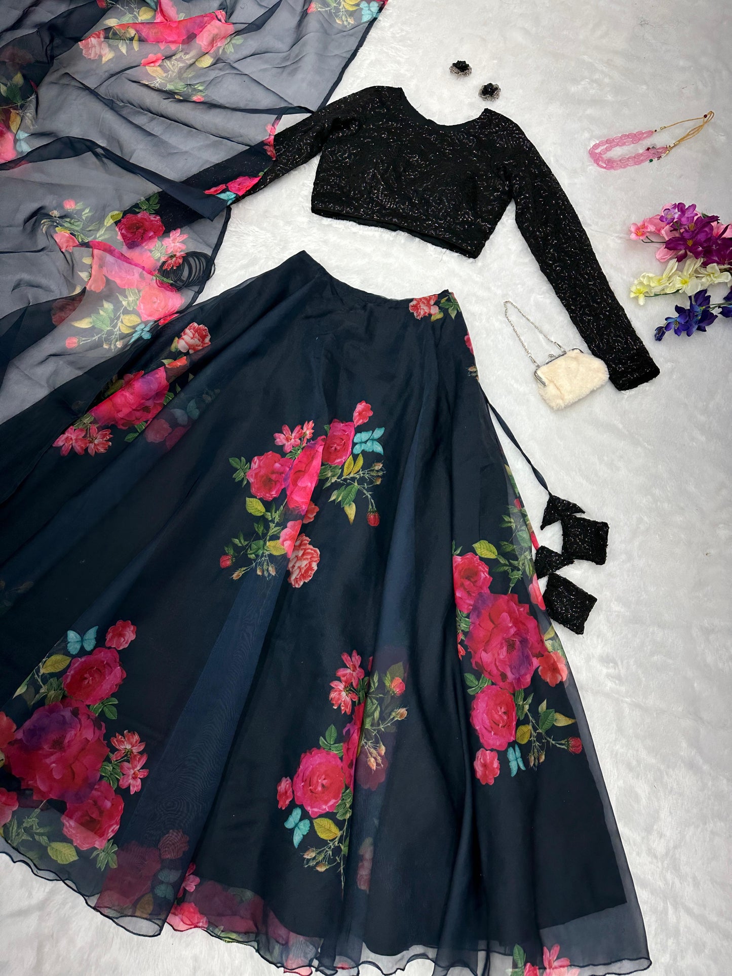 Exclusive Black Sequin Blouse with Organza Floral Lehenga Set.