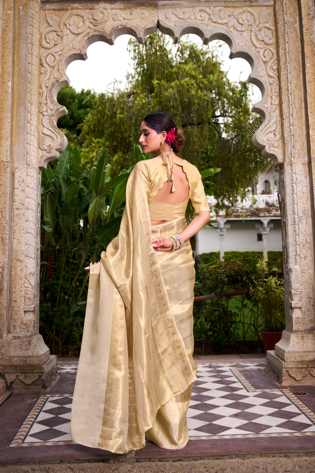 Regal Gold Tissue Saree with Zari Weaving Work.