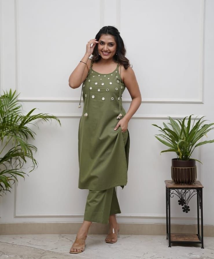 Elegant Sleeveless Cotton Flex Cord Set with Mirror Work.