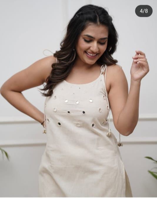 Elegant Sleeveless Cotton Flex Cord Set with Mirror Work.