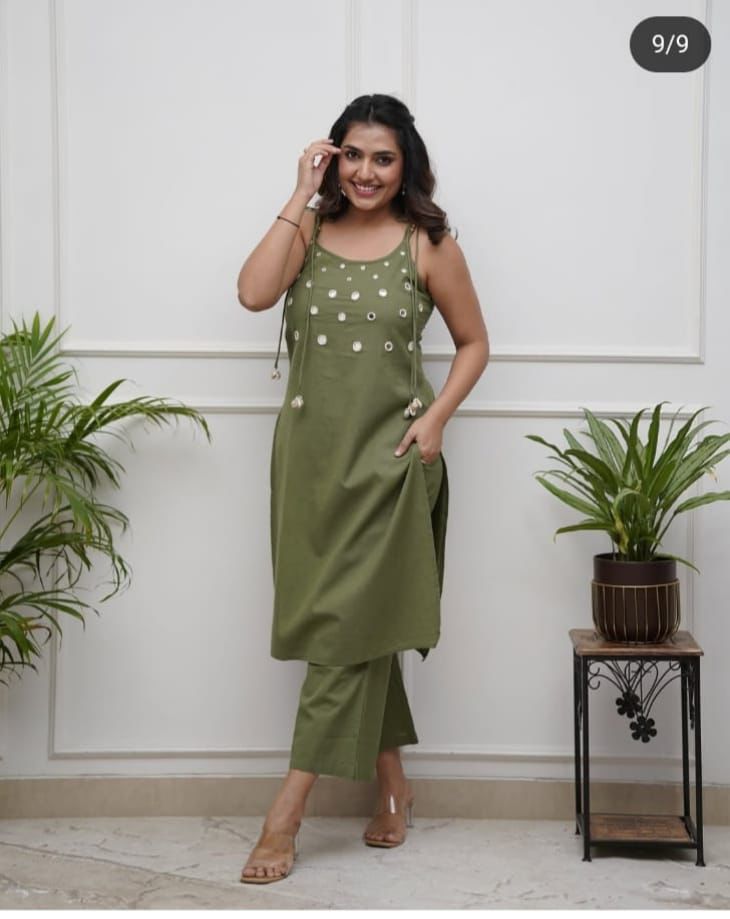 Elegant Sleeveless Cotton Flex Cord Set with Mirror Work.