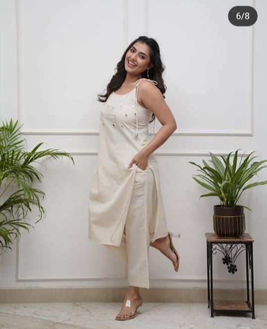 Elegant Sleeveless Cotton Flex Cord Set with Mirror Work.