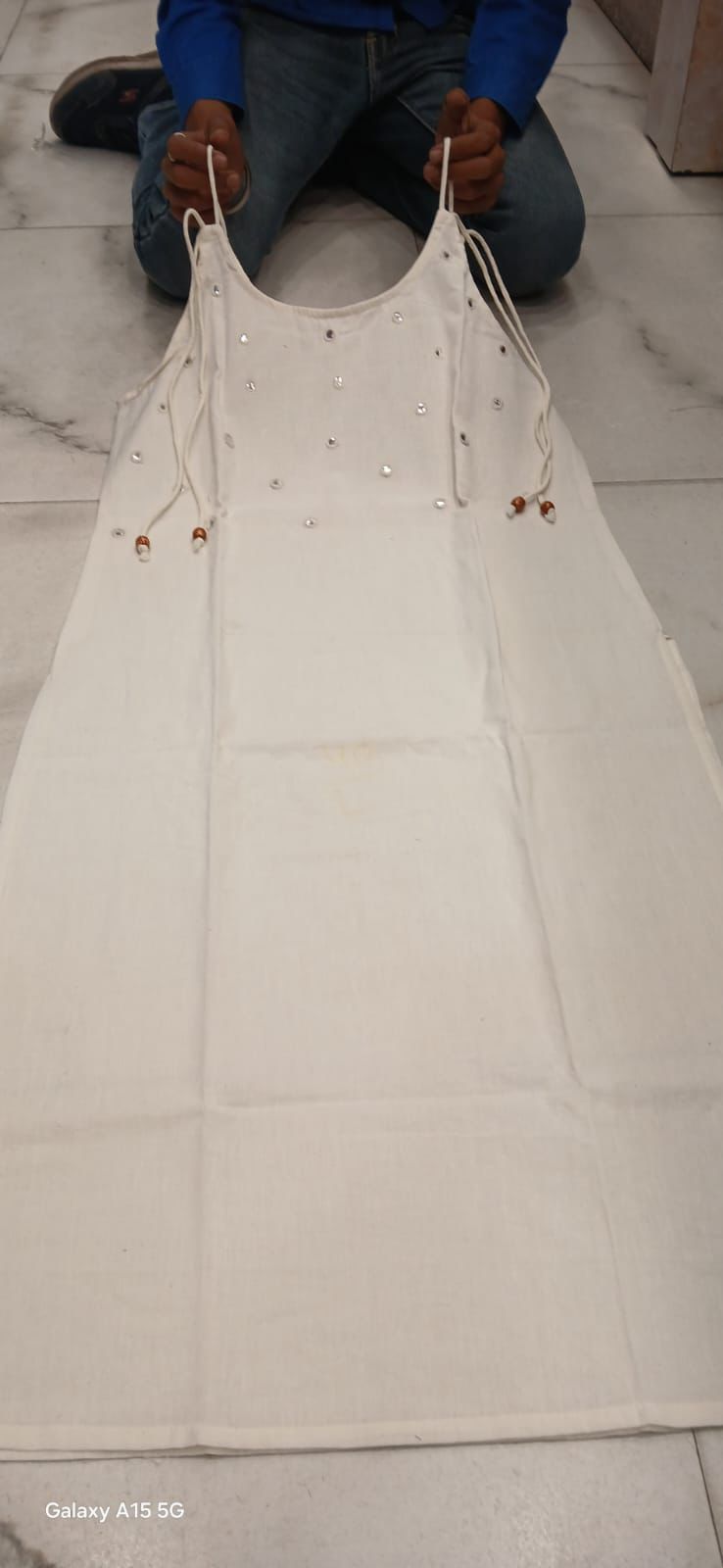 Elegant Sleeveless Cotton Flex Cord Set with Mirror Work.