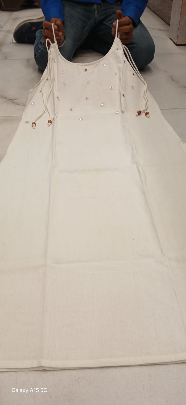 Elegant Sleeveless Cotton Flex Cord Set with Mirror Work.