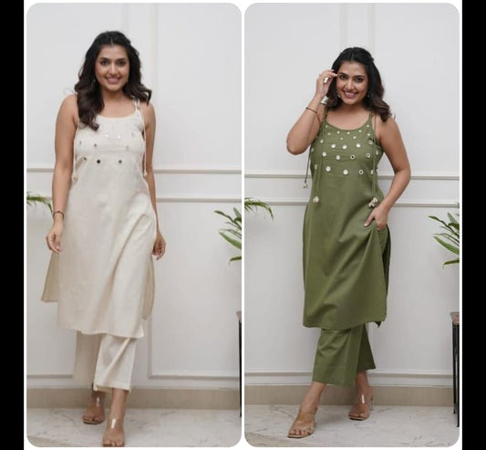 Elegant Sleeveless Cotton Flex Cord Set with Mirror Work.