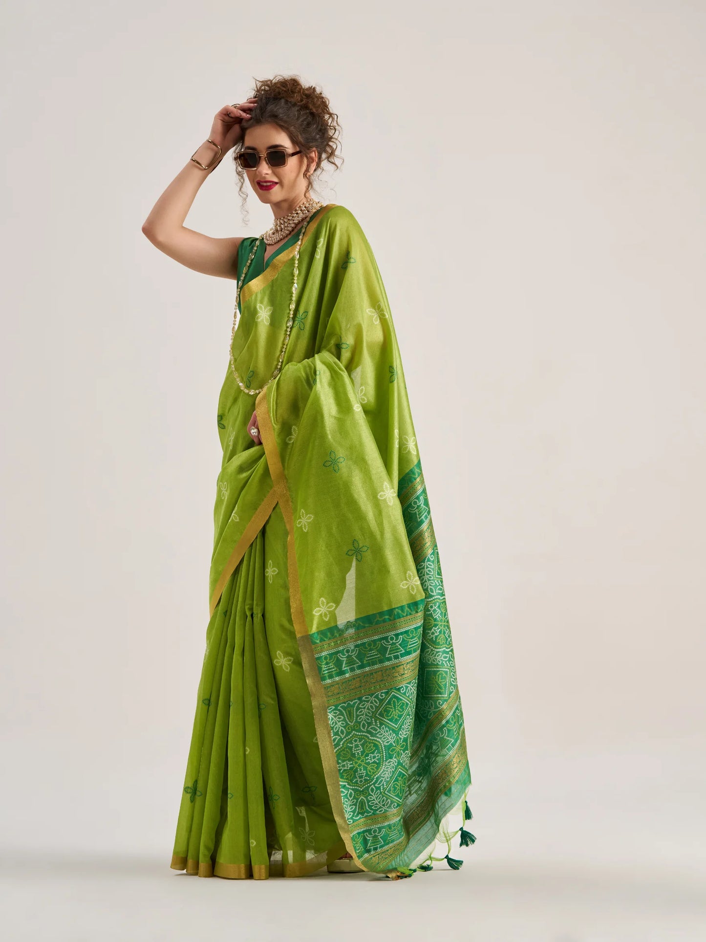 Art work Bandhej Saree with Patola Weaving.