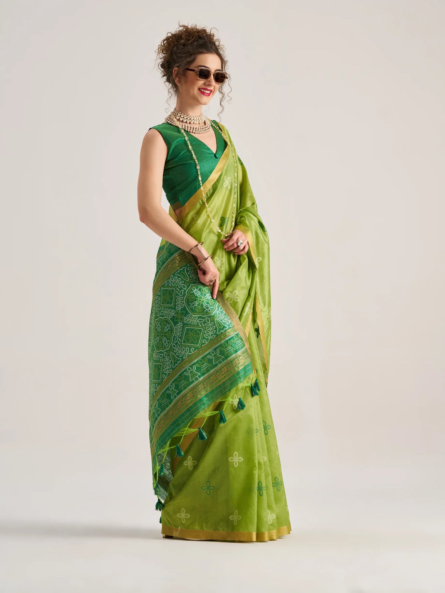 Art work Bandhej Saree with Patola Weaving.