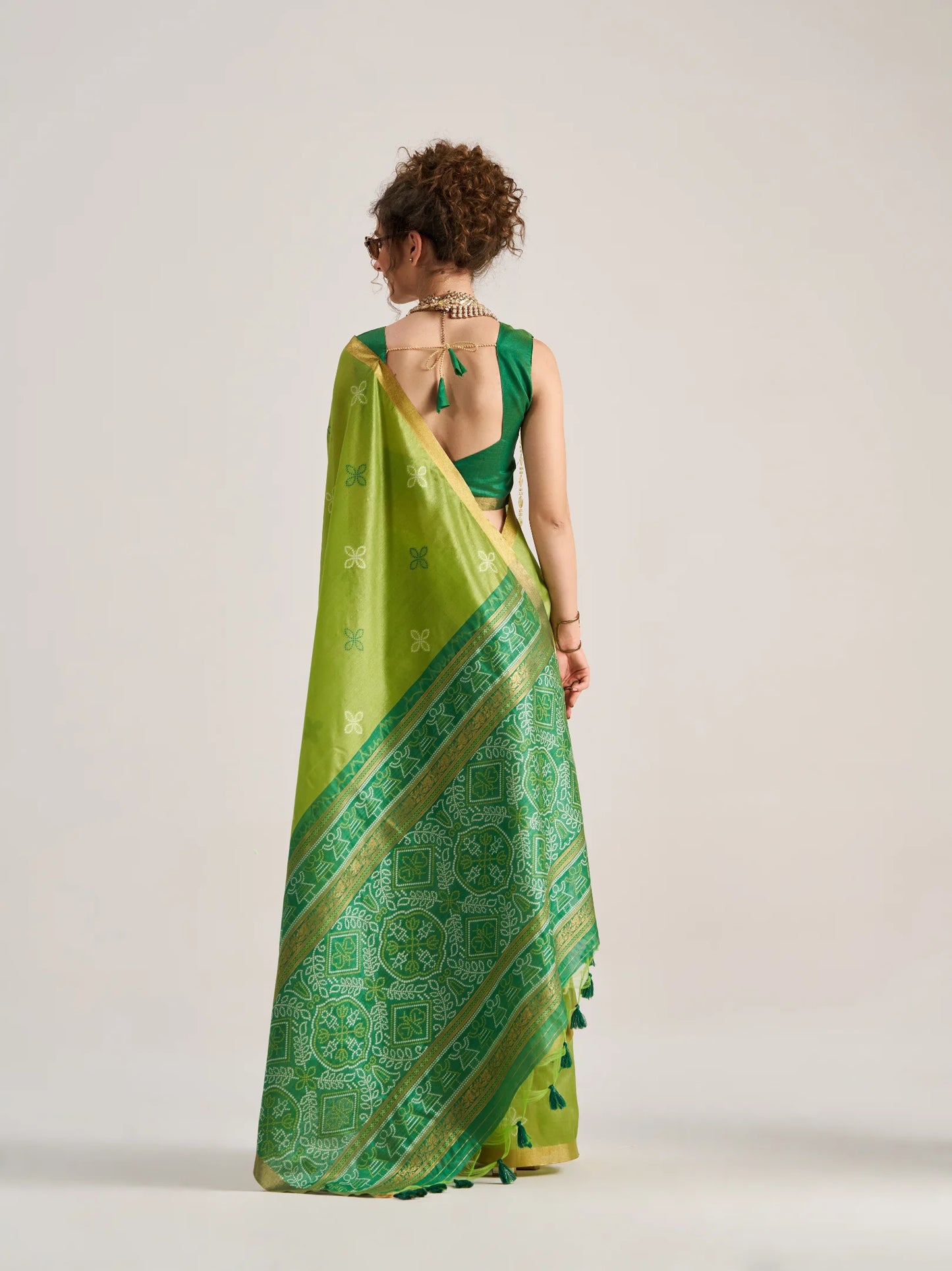 Art work Bandhej Saree with Patola Weaving.