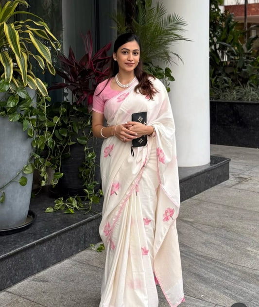 WHISPERS OF BLOSSOM – Ivory Linen Saree with Pink Floral Elegance