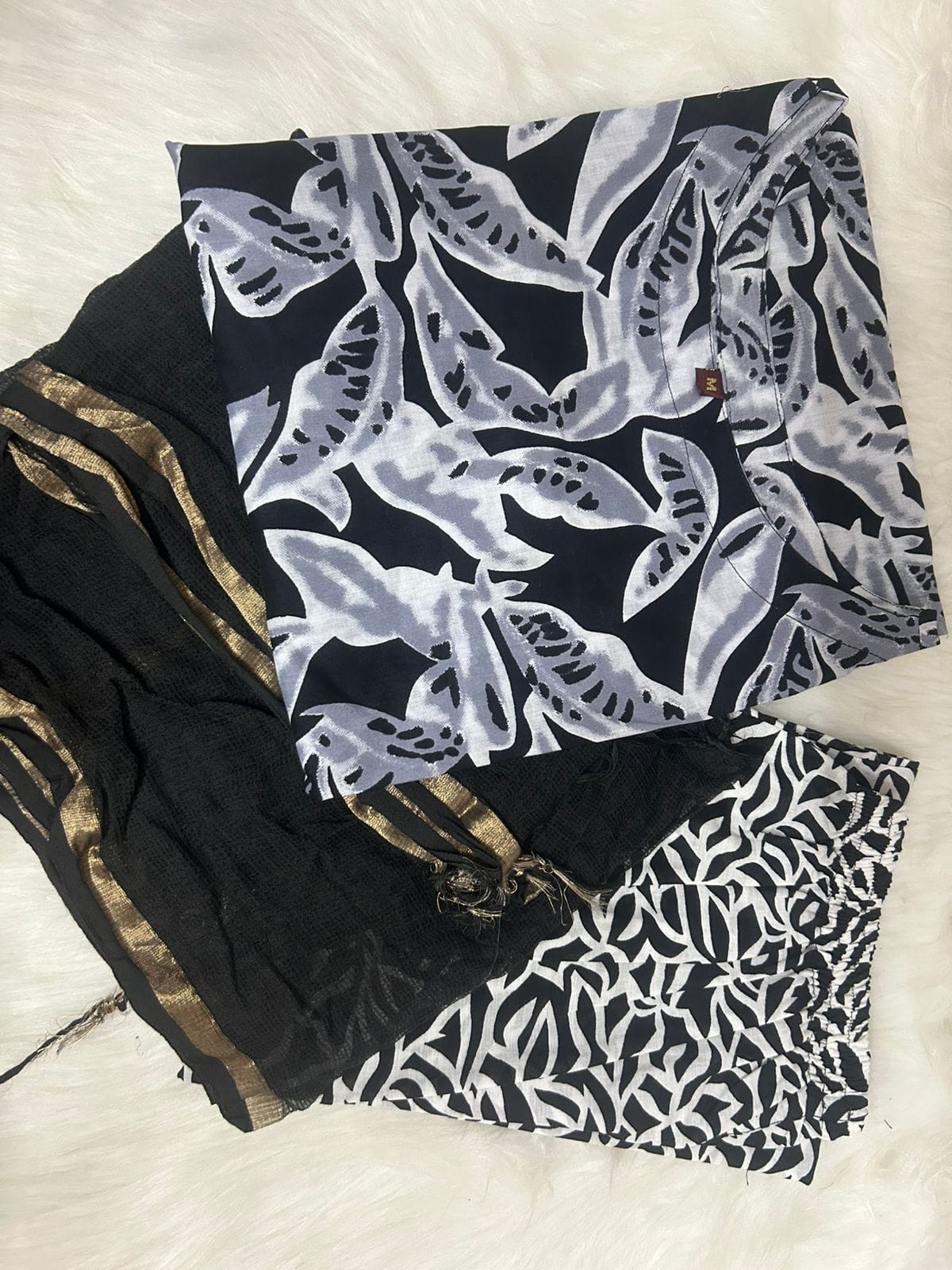 Black Base with White Floral Design Kurti Set.