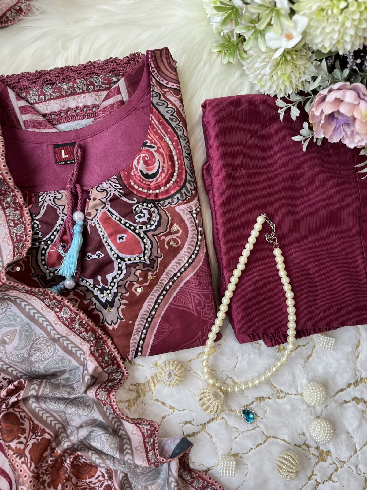 Maroon Muslin Pakistani Suit Set with Golden Accents.