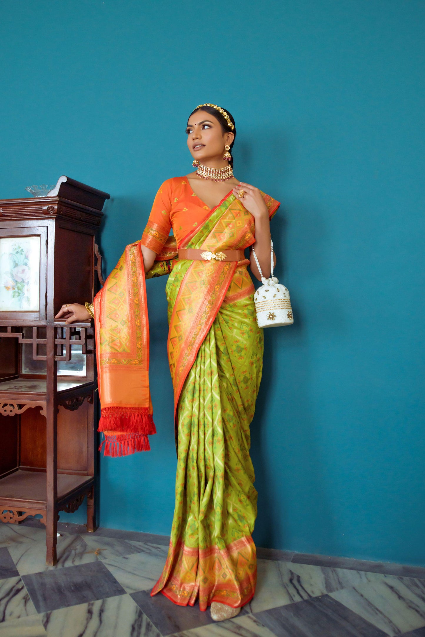 Vibrant Banarasi Silk Saree with Contrast Patola Border & Brocade Blouse.