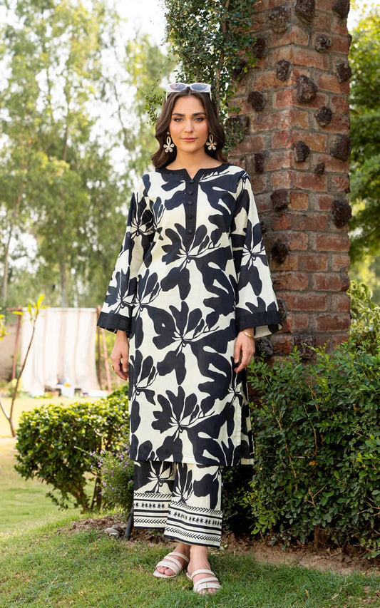 White Kurti Set with Bold Black Leaf Print & Palazzo Pants.