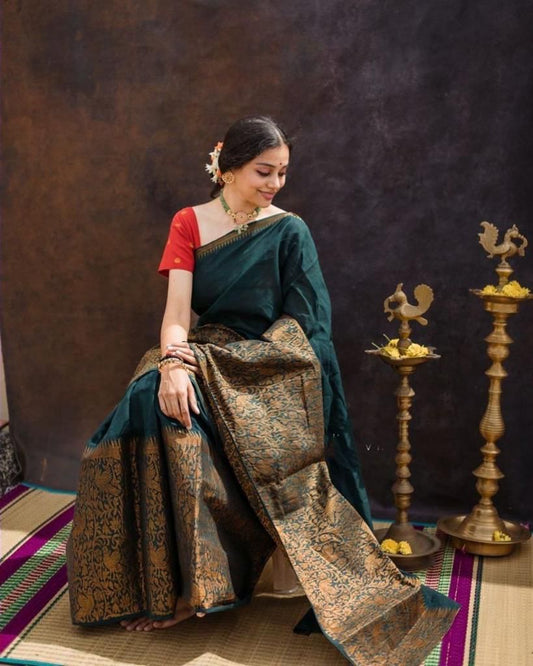 Dark Green Litchi Silk Saree with Red Jacquard Blouse.