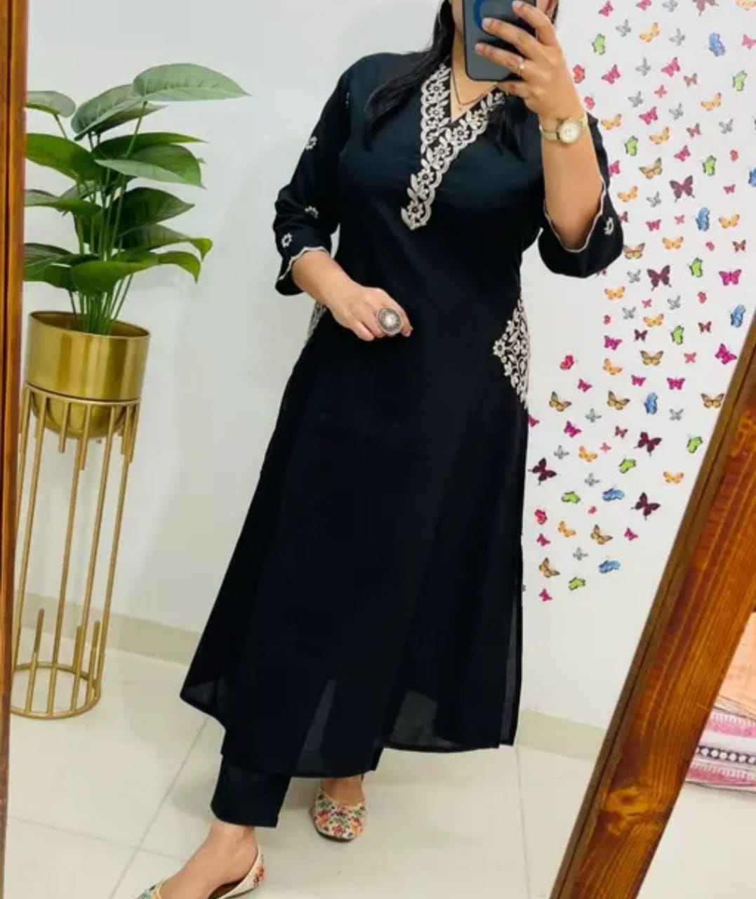 Elegant Black Straight-Cut Kurti with White Embroidery.